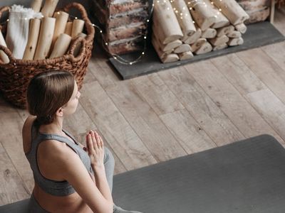 High quality yoga bricks and strap on a mat.